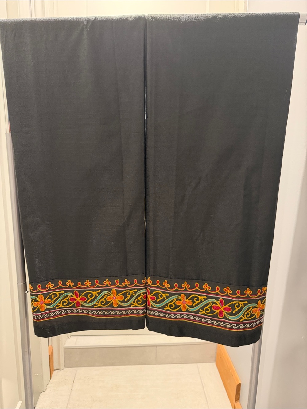 Blackout curtains with embroidered trim